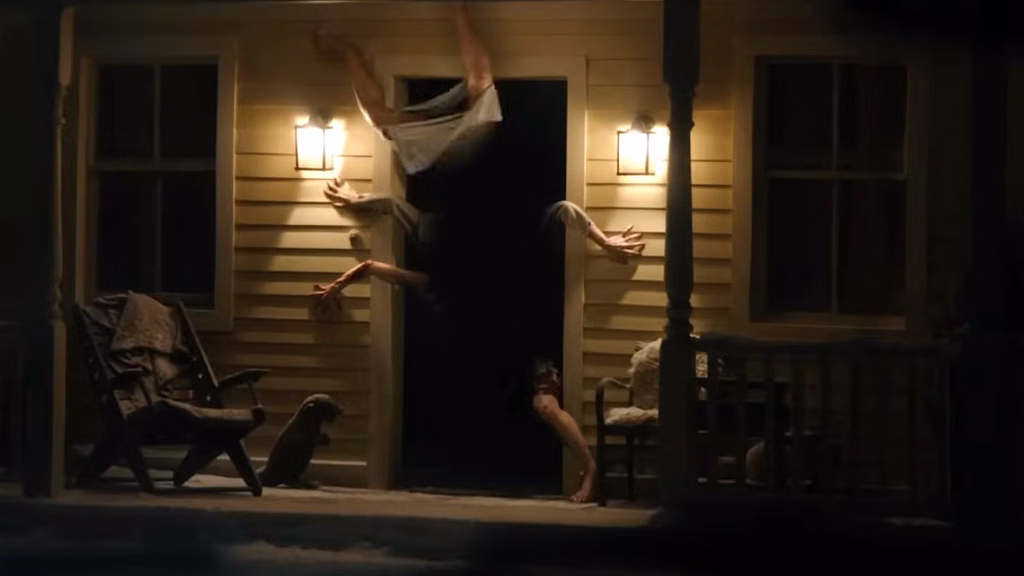 amanylimbedmonsteremergesfromadarkdoorwayinresidentevil2026trailer TOM and CHILL